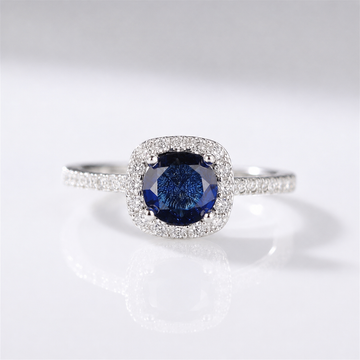 BLUE SAPPHIRE CUSHION HALO RING by Harrison & James - ring product image 1