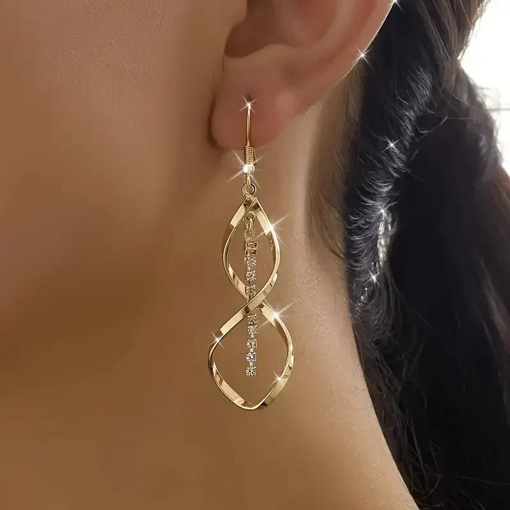 Sunbeam Spiral Earrings | Gold by Harrison & James - earrings product image 1
